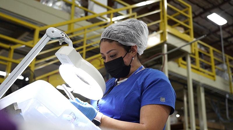 Labcon sterilization facility worker inspecting product